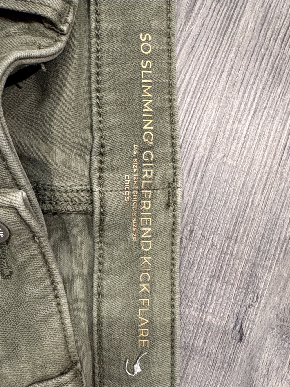 Chico's So Slimming Girlfriend Kick Flare Jeans in a khaki/olive green - Picture 9 of 11
